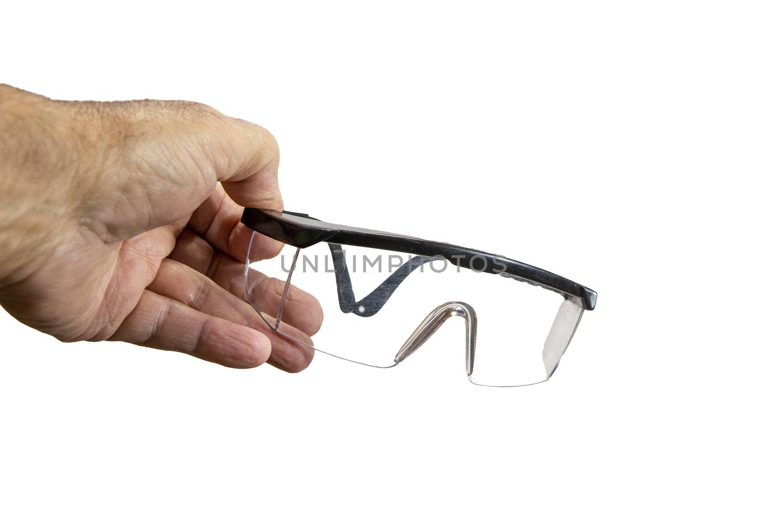 Safety glasses for work in black plastic frames against white background