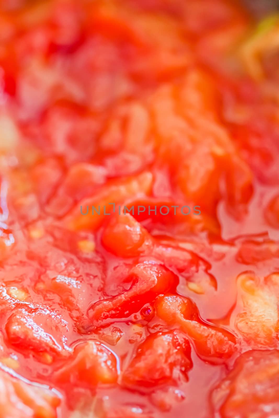 Cooking tomato sauce, closeup steamed vegetables for cook book or food blog background by Anneleven