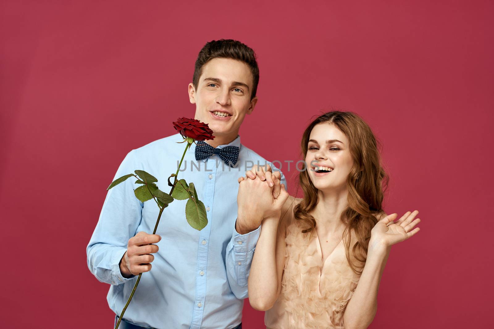 married couple man and woman romance red rose isolated background holiday flowers. High quality photo