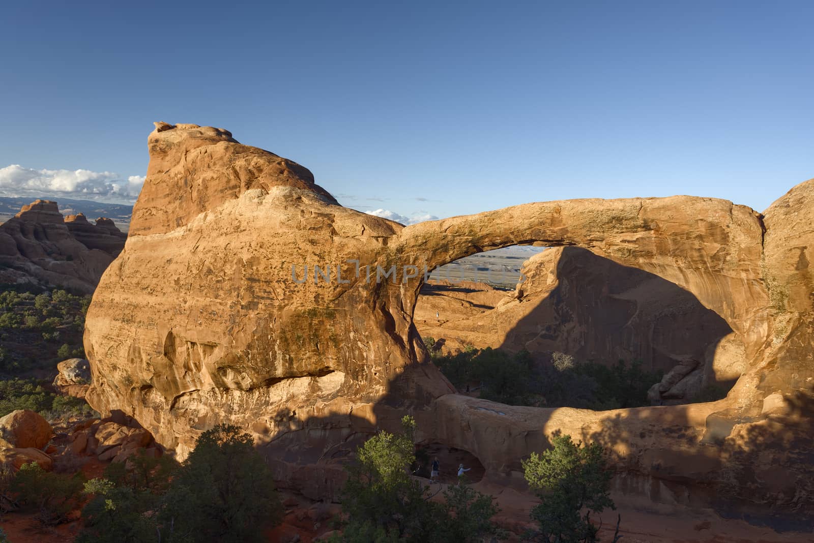 Sunny view on Double O Arch, Arches National Park, Utah.