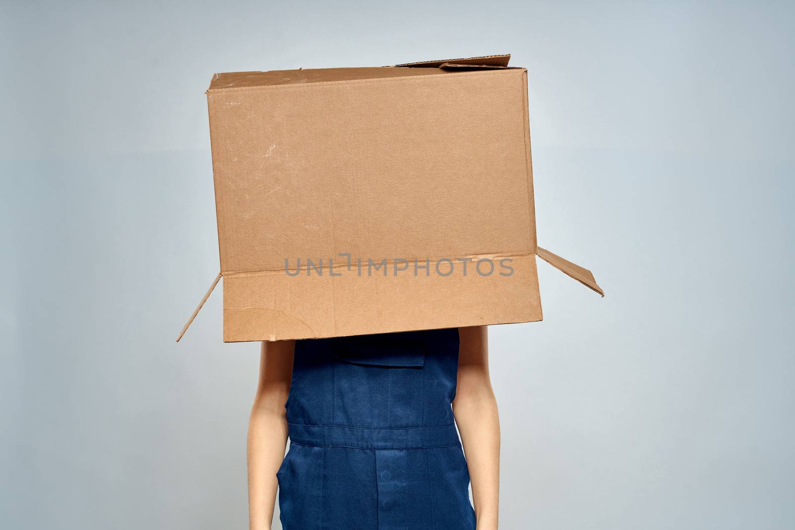 Woman in working uniform box packing service lifestyle. High quality photo