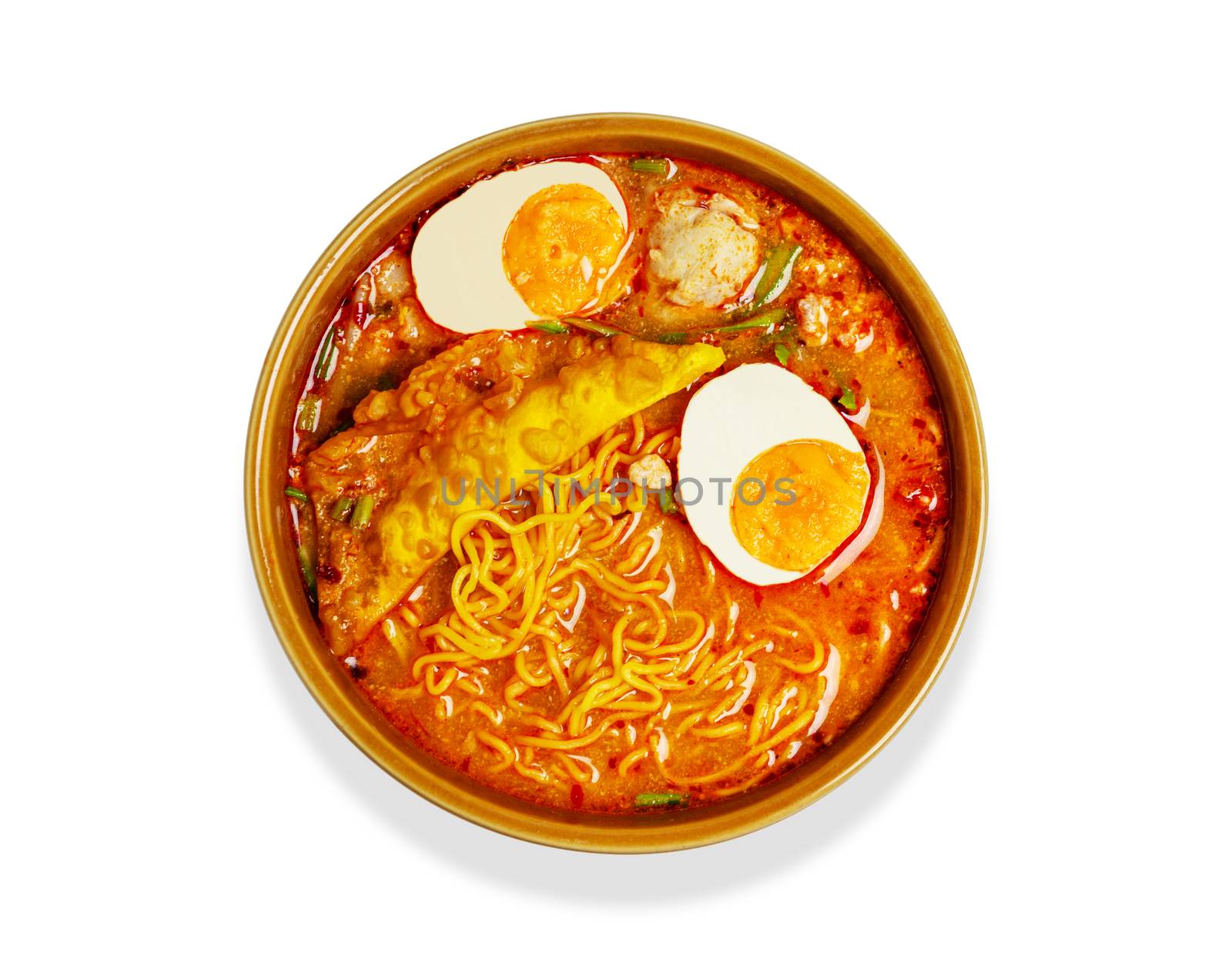Noodle in bowl with vegetables and pork balls Isolated on white background with clipping path, Asia noodle life style, Spicy noodle in brown bowl, Tasty asian noodle