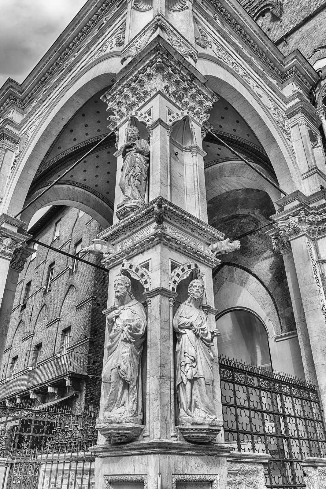 Detail of Palazzo Pubblico, main landmark in Siena, Italy by marcorubino