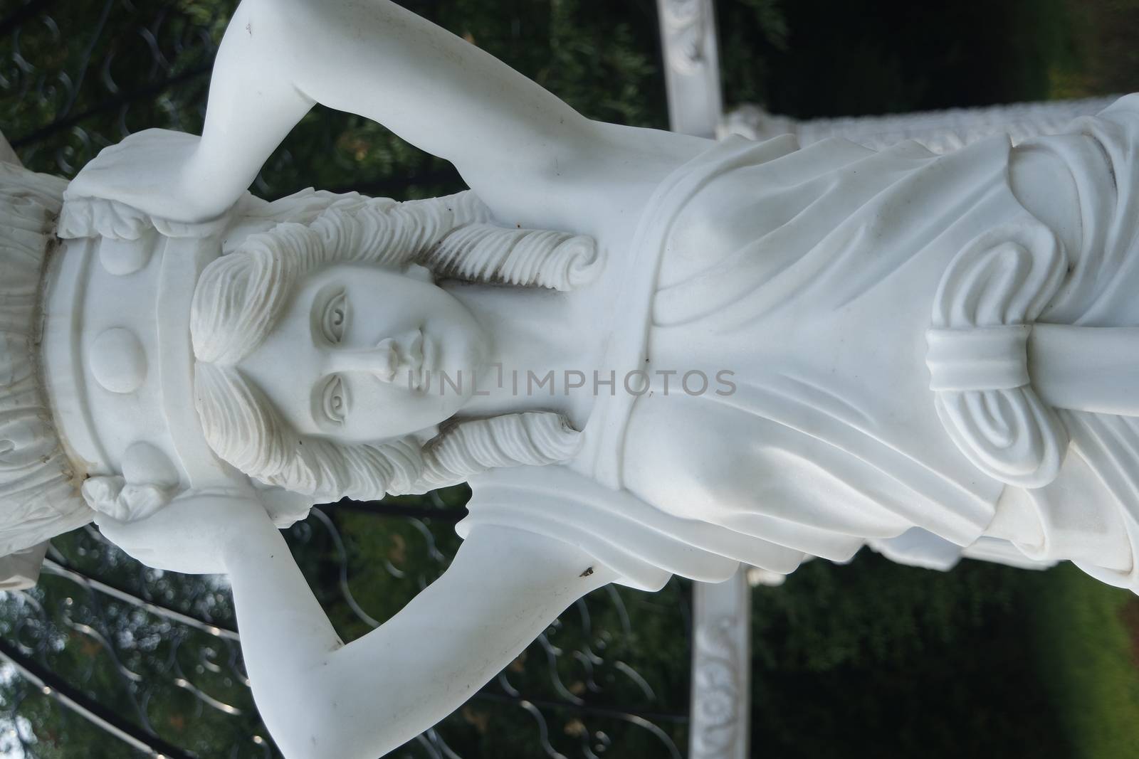 CHUNCHEON, SOUTH KOREA- October-03, 2020: White marble statue of Greek Goddess Head with lovely hair settled in a public park