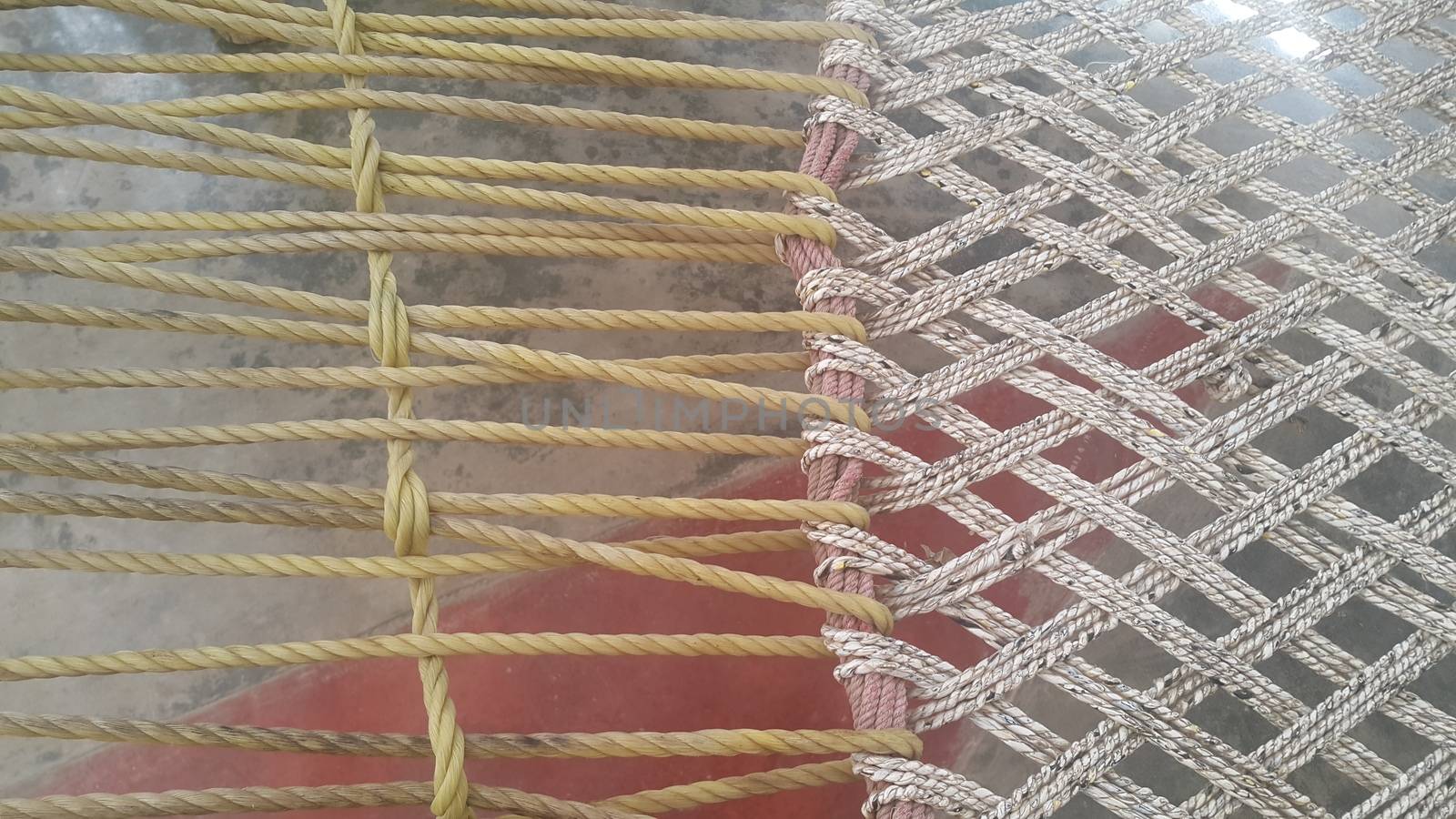 Closeup view of dried jute thread or ropes interwoven for making traditional old style bed called charpai
