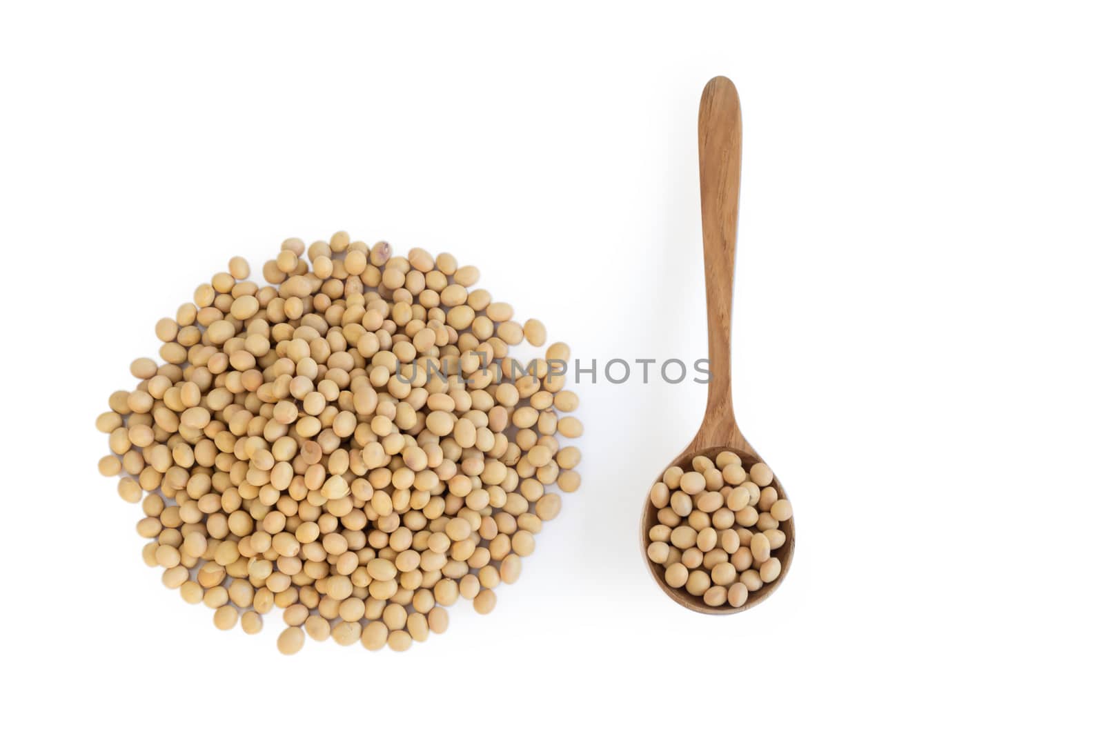 Soy beans in wooden spoon isolated on white backgroun, health care concept