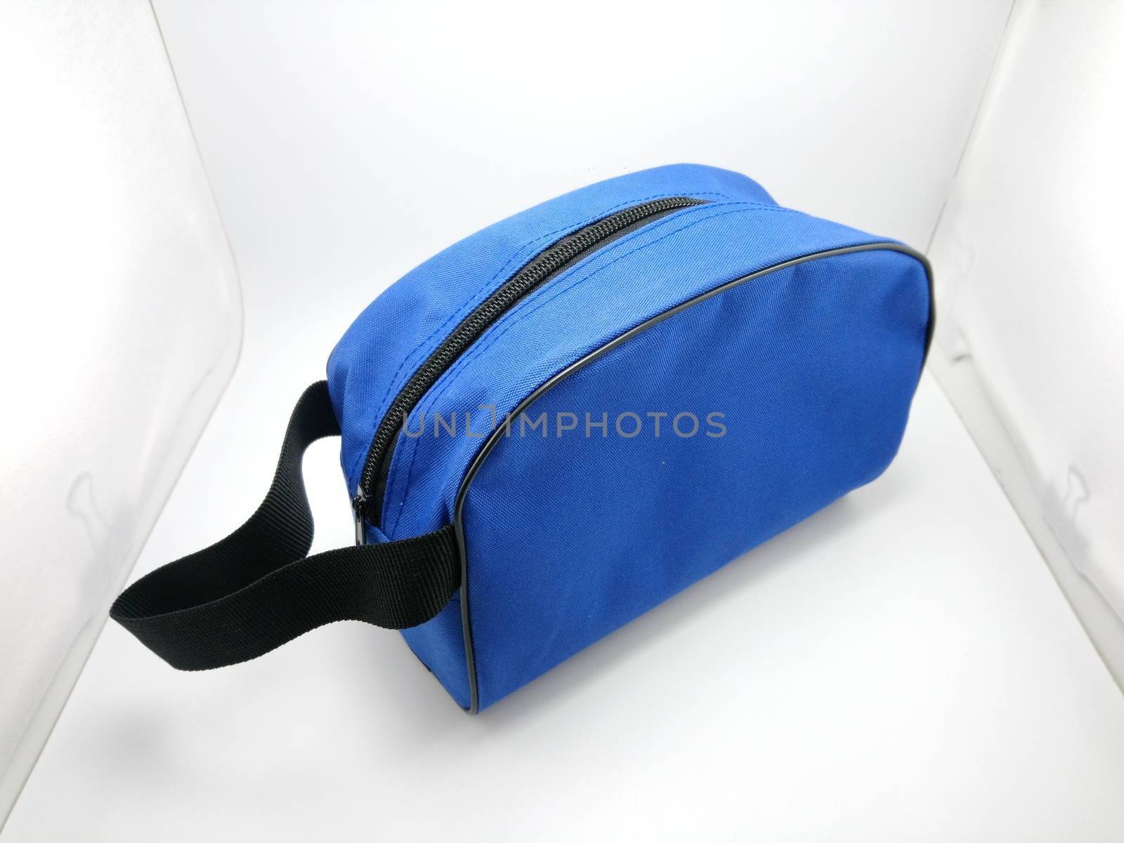 Blue portable hand bag with sling use to put stuffs inside