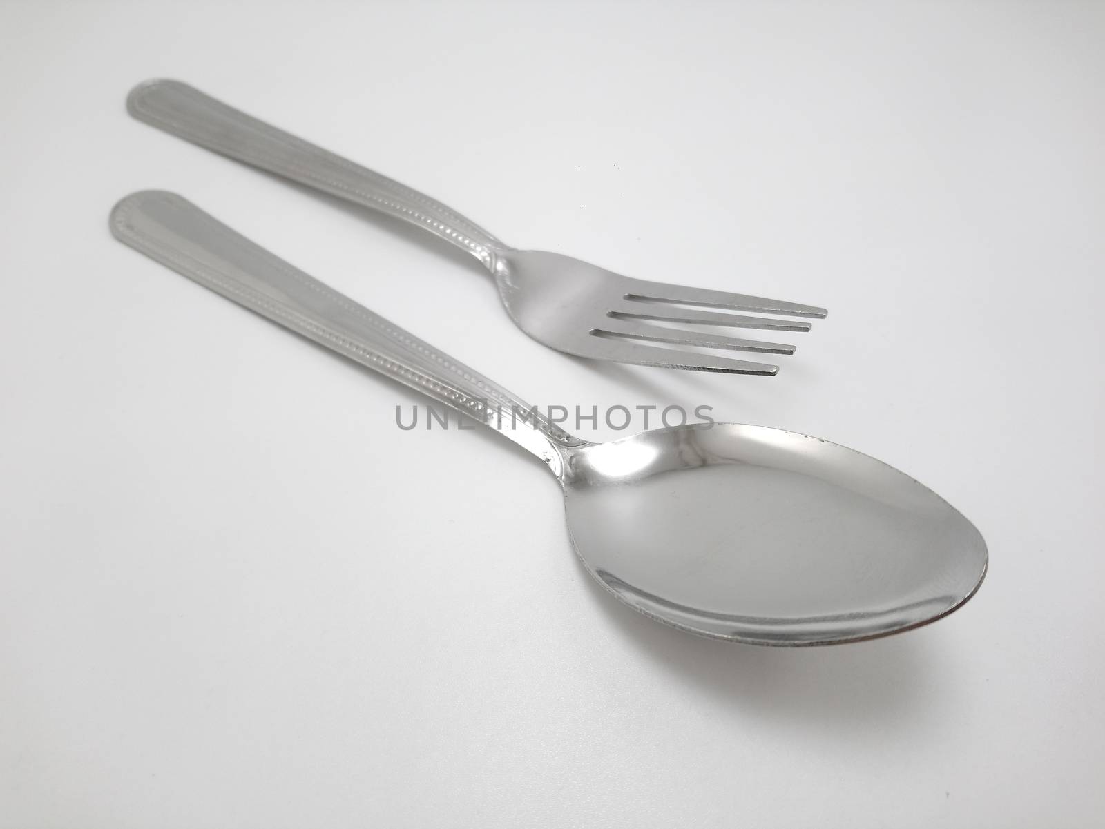 Stainless steel metal eating utensil spoon and fork use for eating food meal