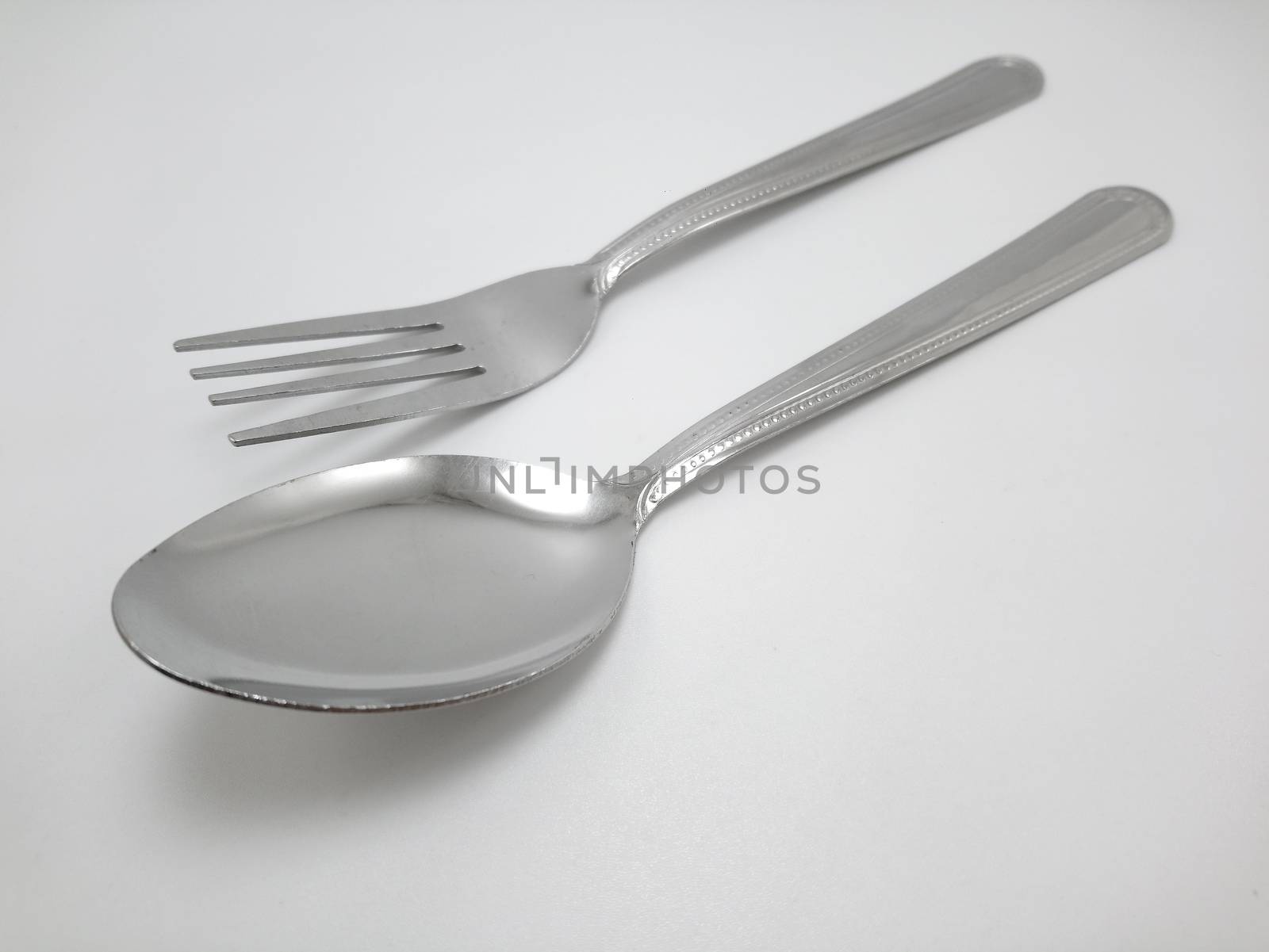 Stainless steel metal eating utensil spoon and fork use for eating food meal