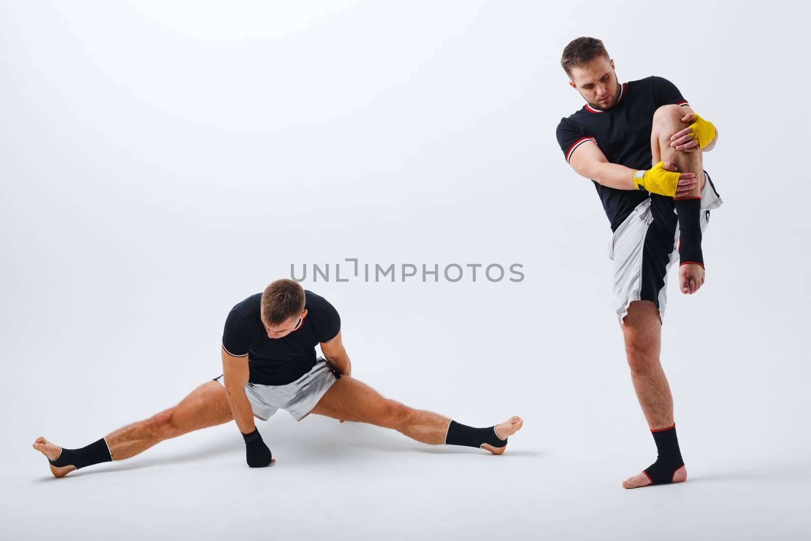 Two men boxers fighting muay thai peparing boxing by primipil