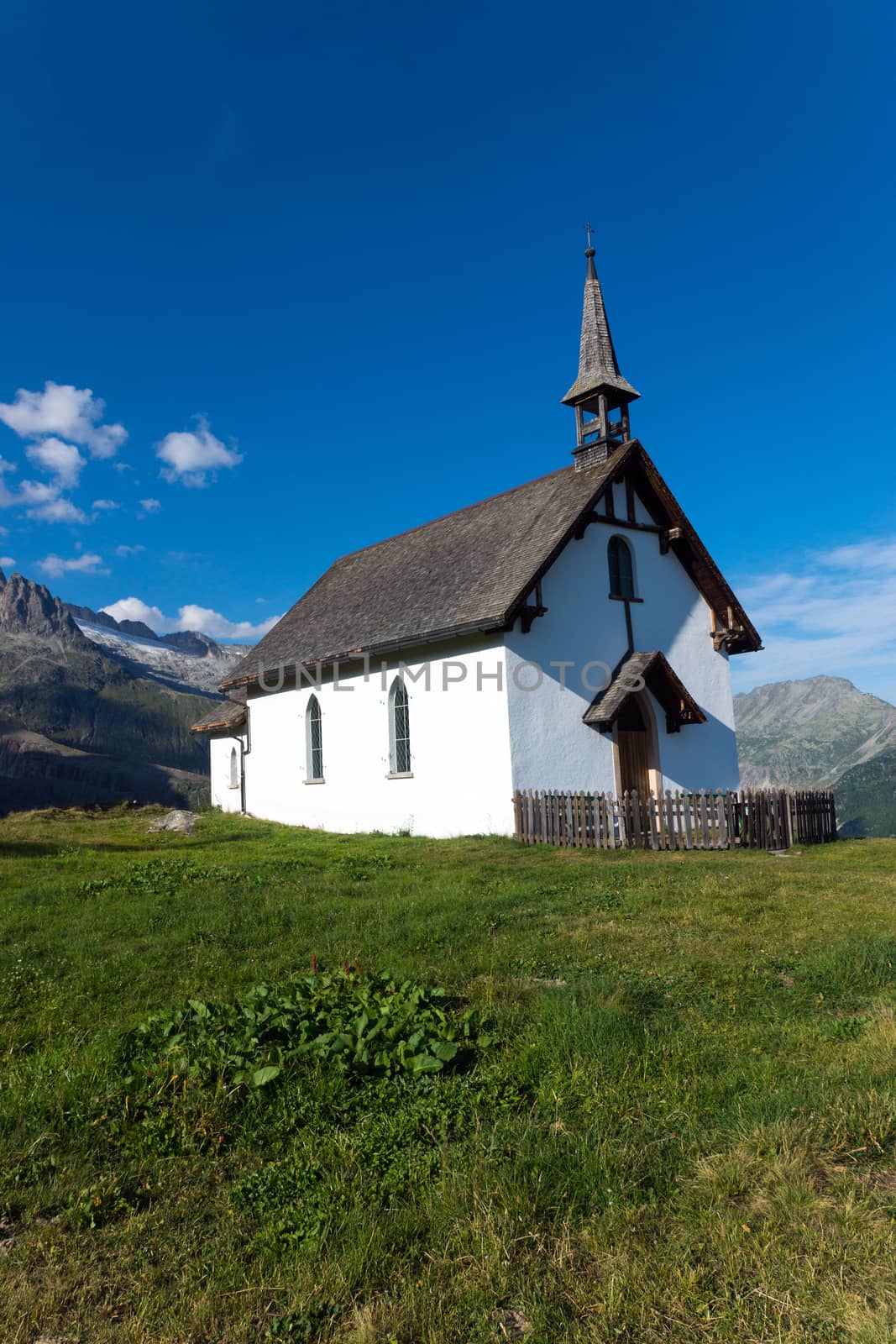 A small white church in the alps of the Valais, Switzerland