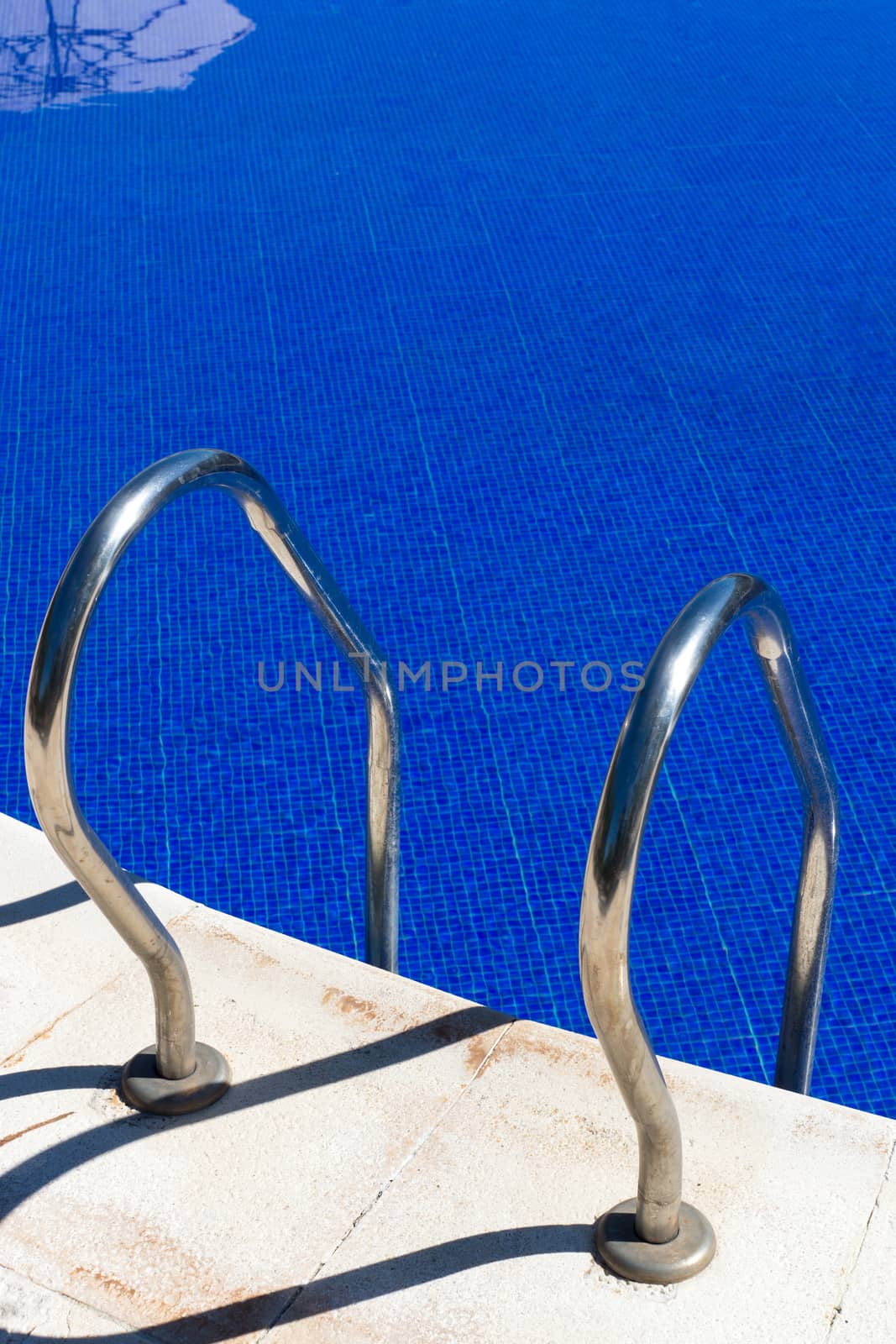 Access to a beautiful swimming pool with clear blue water