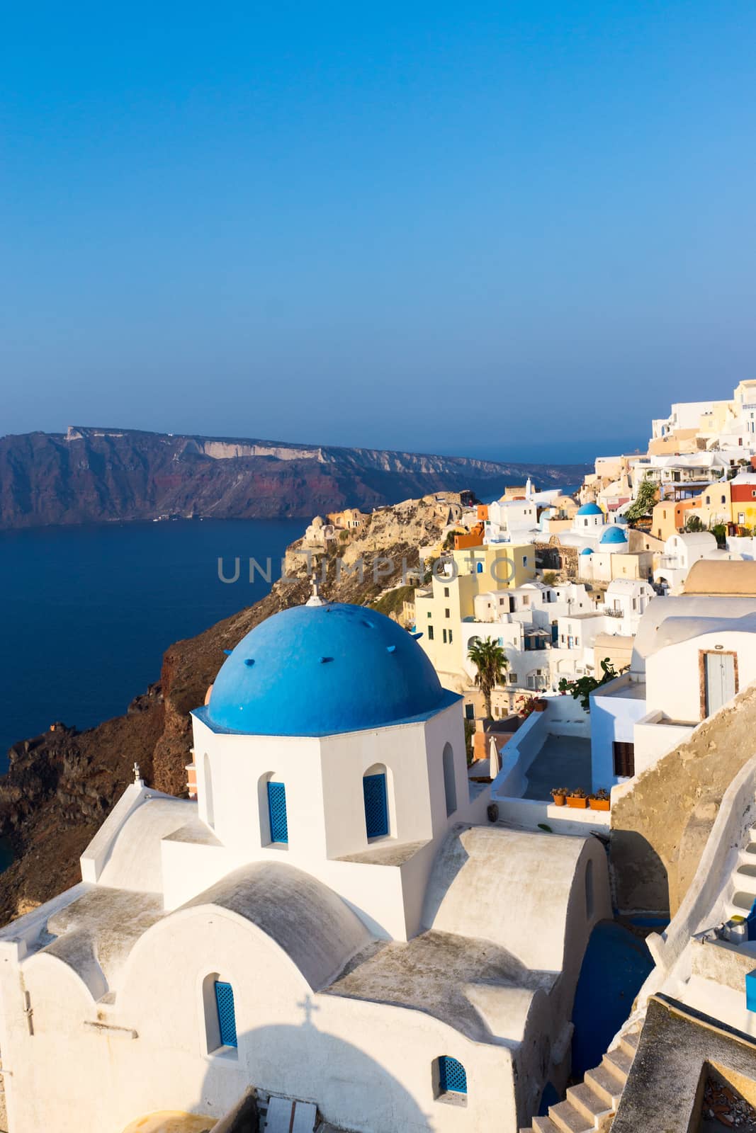 View over Oia on Santorini islands with one of the beautiful churches