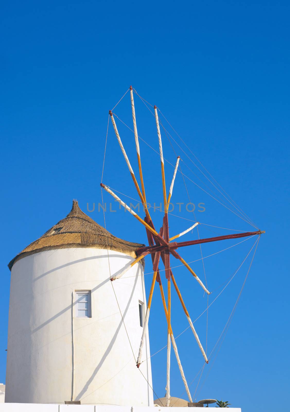 A traditional windmill seen on a cyclades island in Greece