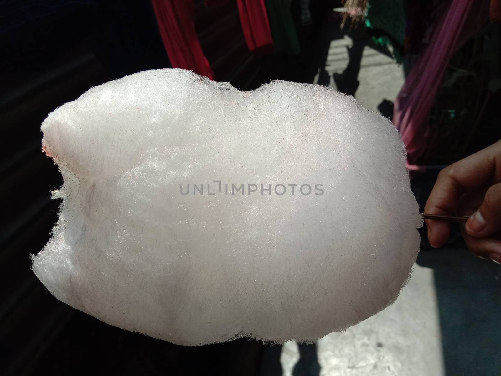 tasty and healthy white colored cotton candy