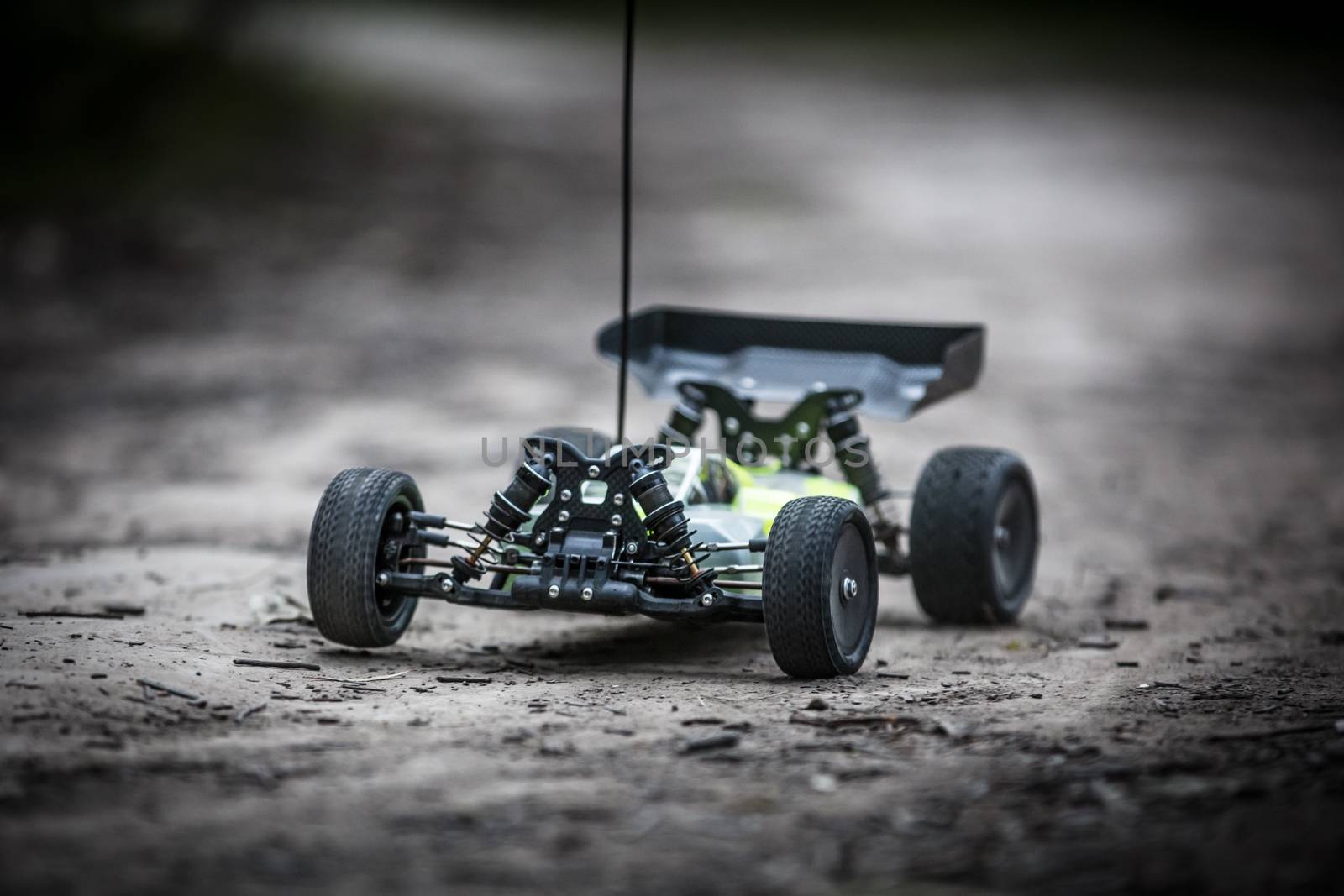 An offroad radio controlled car in action in rural bushland in Victoria, Australia