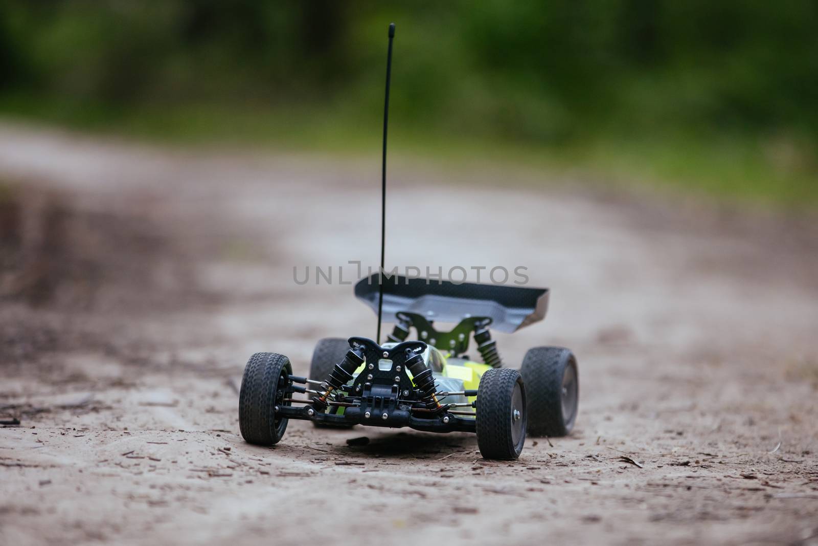An offroad radio controlled car in action in rural bushland in Victoria, Australia