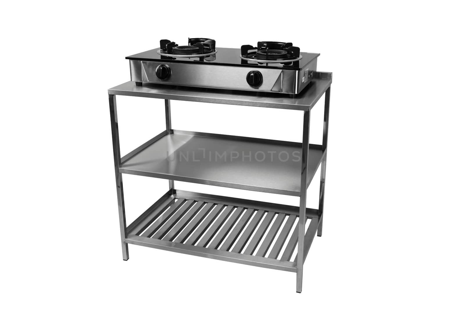 Blurred Gas stove on table of stainless on isolated white background.