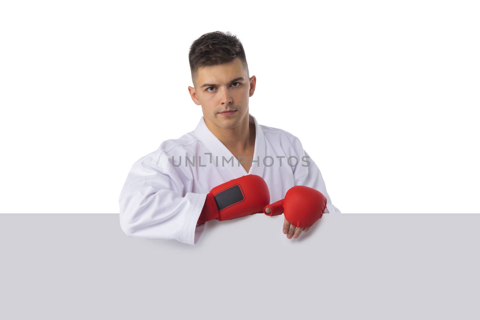 Man training taekwondo on white by ALotOfPeople