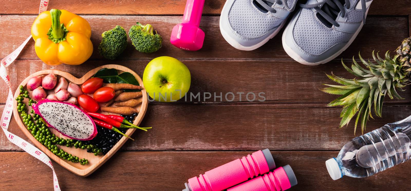 fruit and vegetable in heart plate and sports shoes, dumbbell an by Sorapop