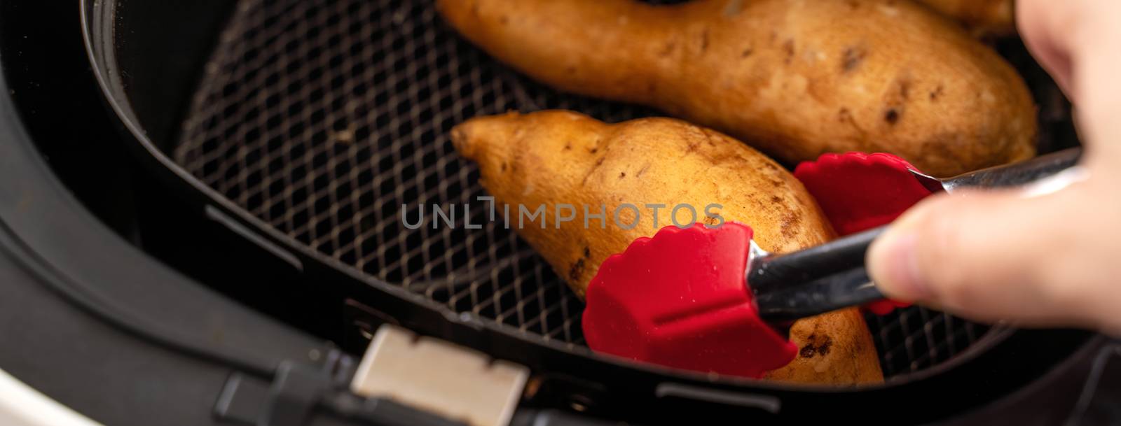 Roasted sweet potato cooked by airfryer at home. Healthy food for diet eating.