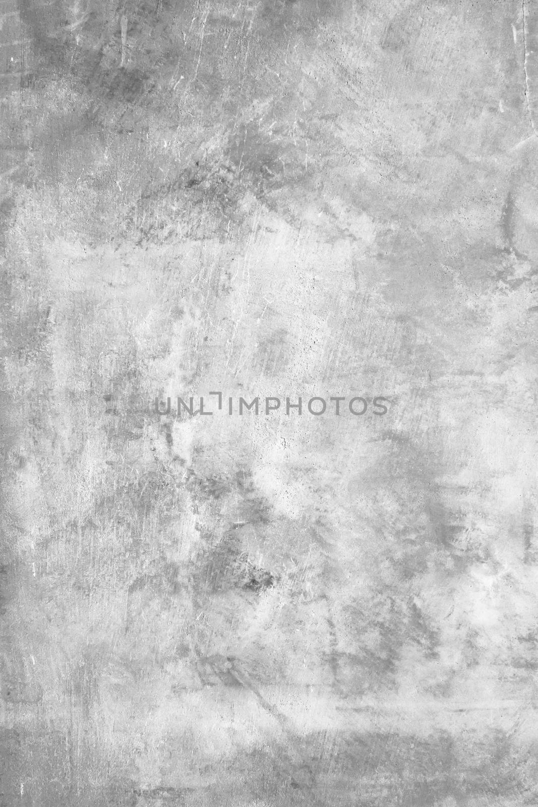 Grungy rough concrete wall. White rough concrete wall. It can be used as textures and backgrounds.