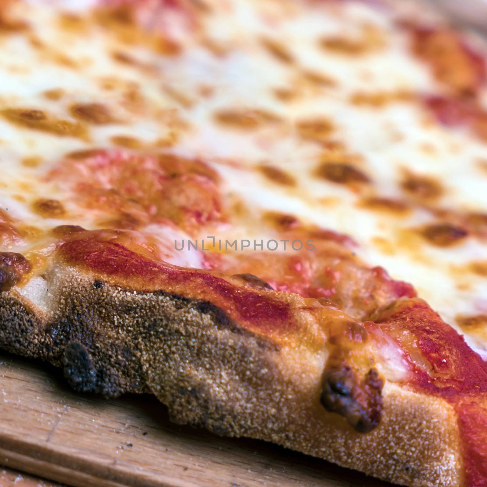 Pizza Margherita close-up by germanopoli