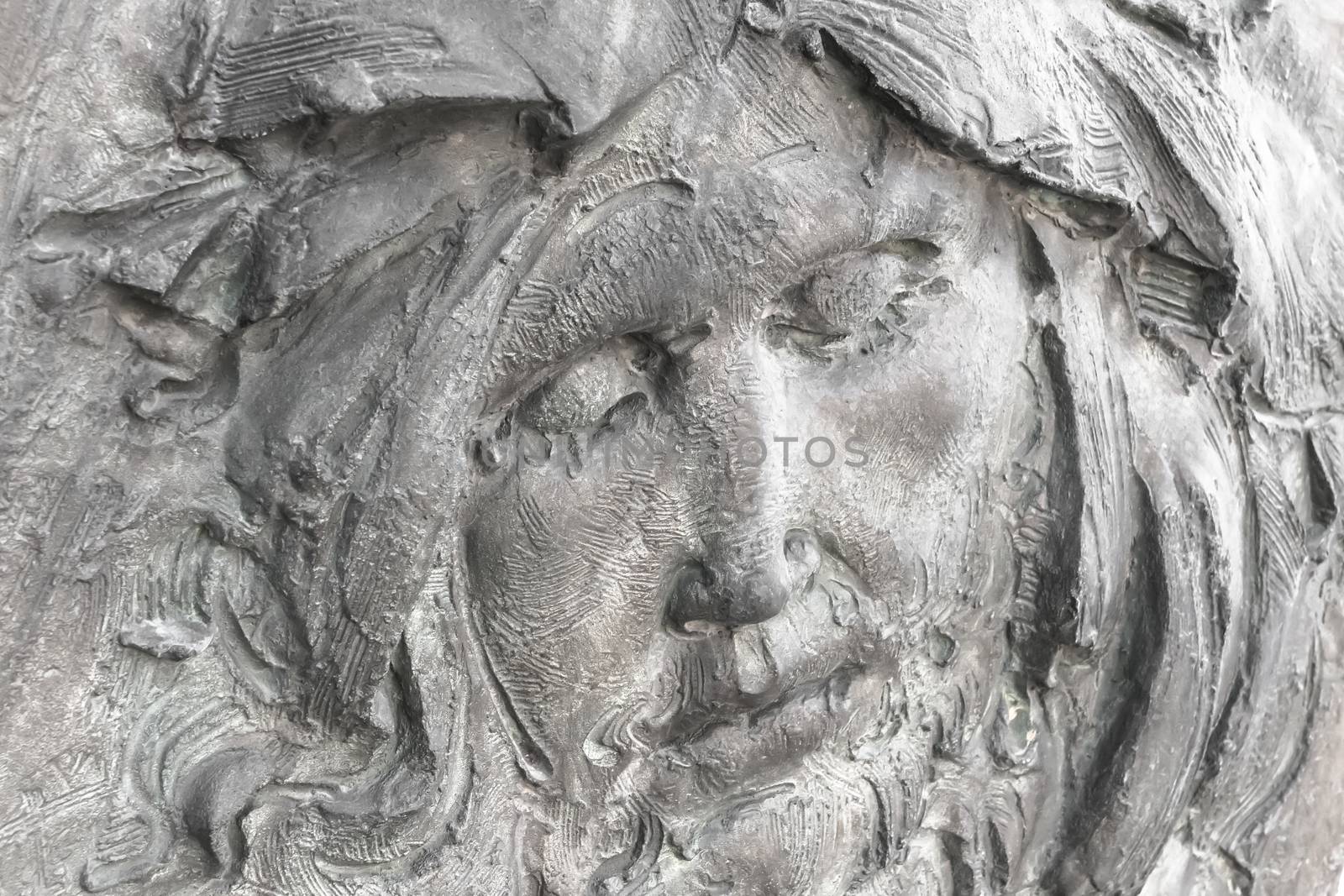 Face of Jesus Christ (fragment of statue). Antique stone statue of Jesus Christ.
