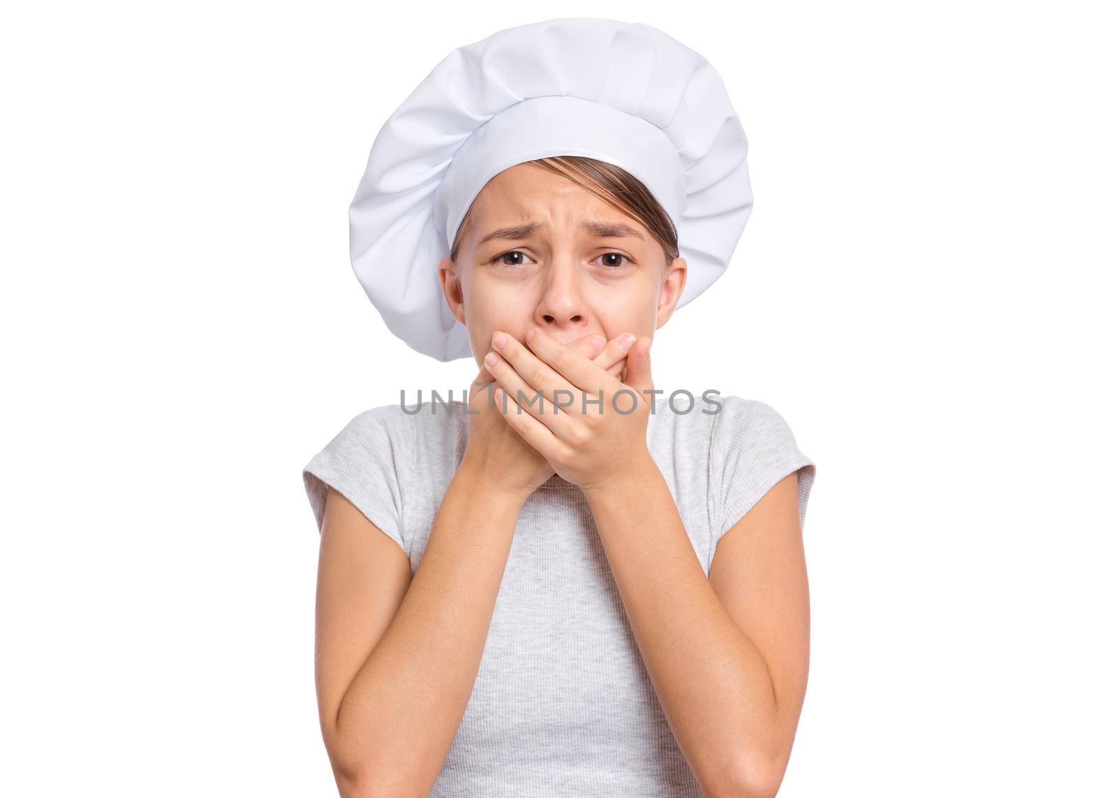 Teen girl in chef hat with emotions showing signs with hands, isolated on a white background.