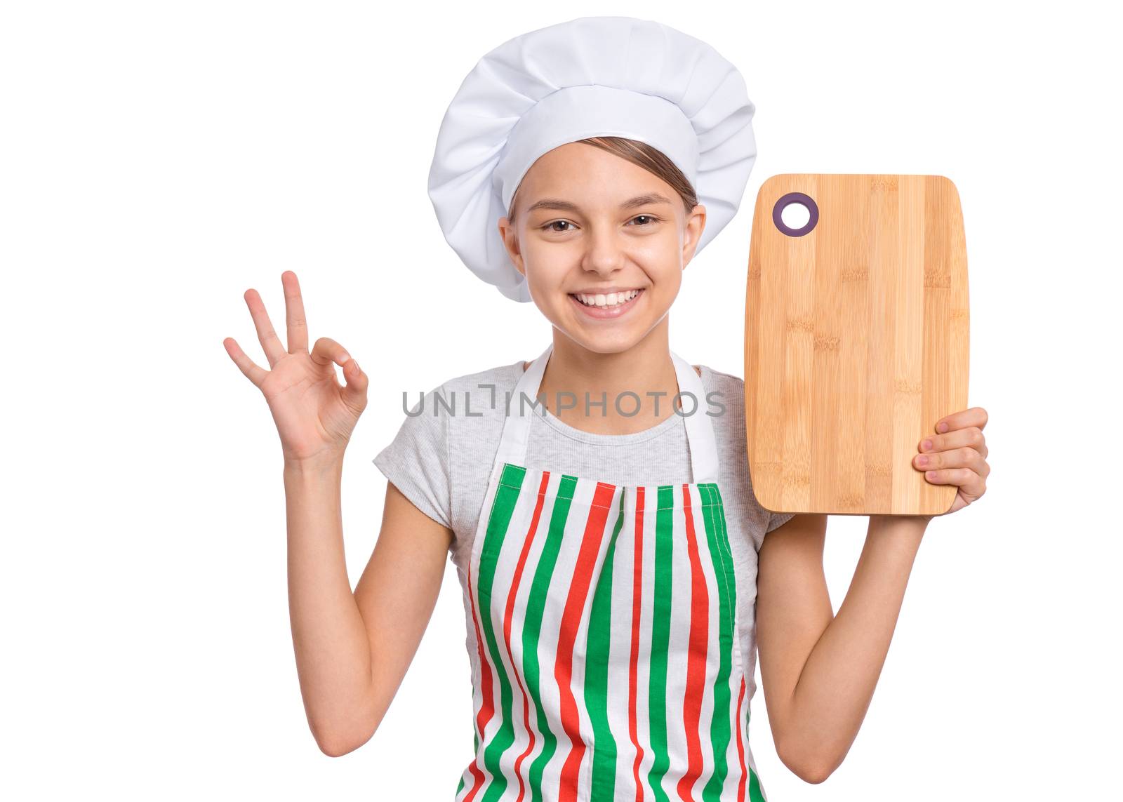 Cute girl in chef uniform isolated on white background showing menu blackboard and Perfect hand sign