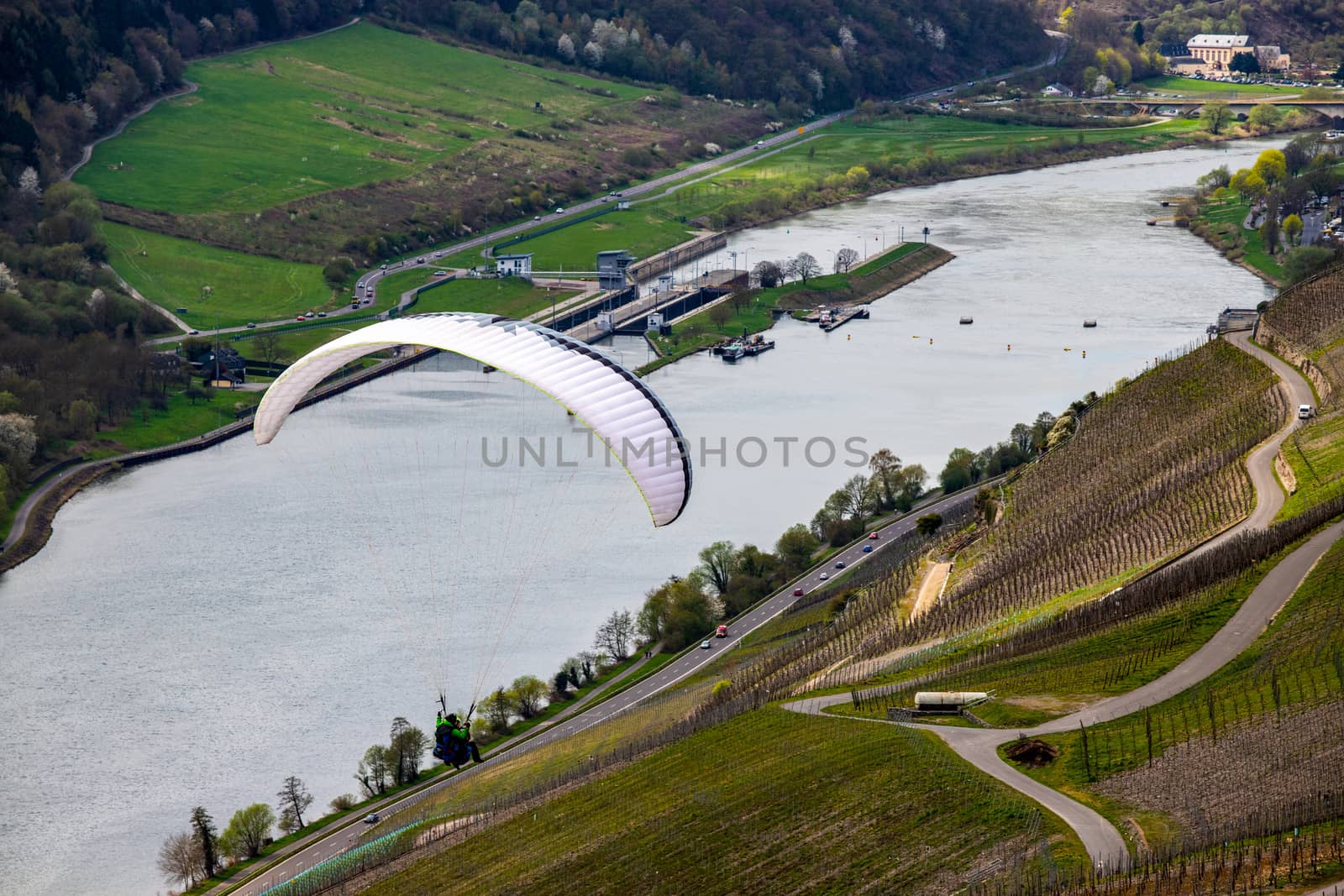 Paraglider over river Moselle, Germany by reinerc