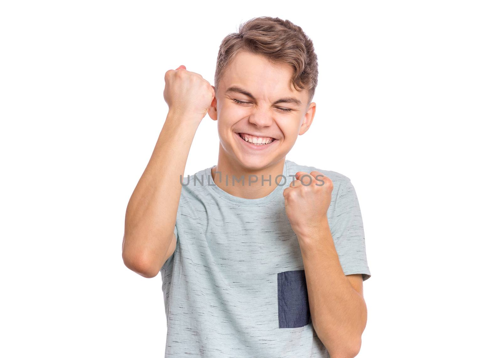 Happy boy showing victory sign isolated on white background