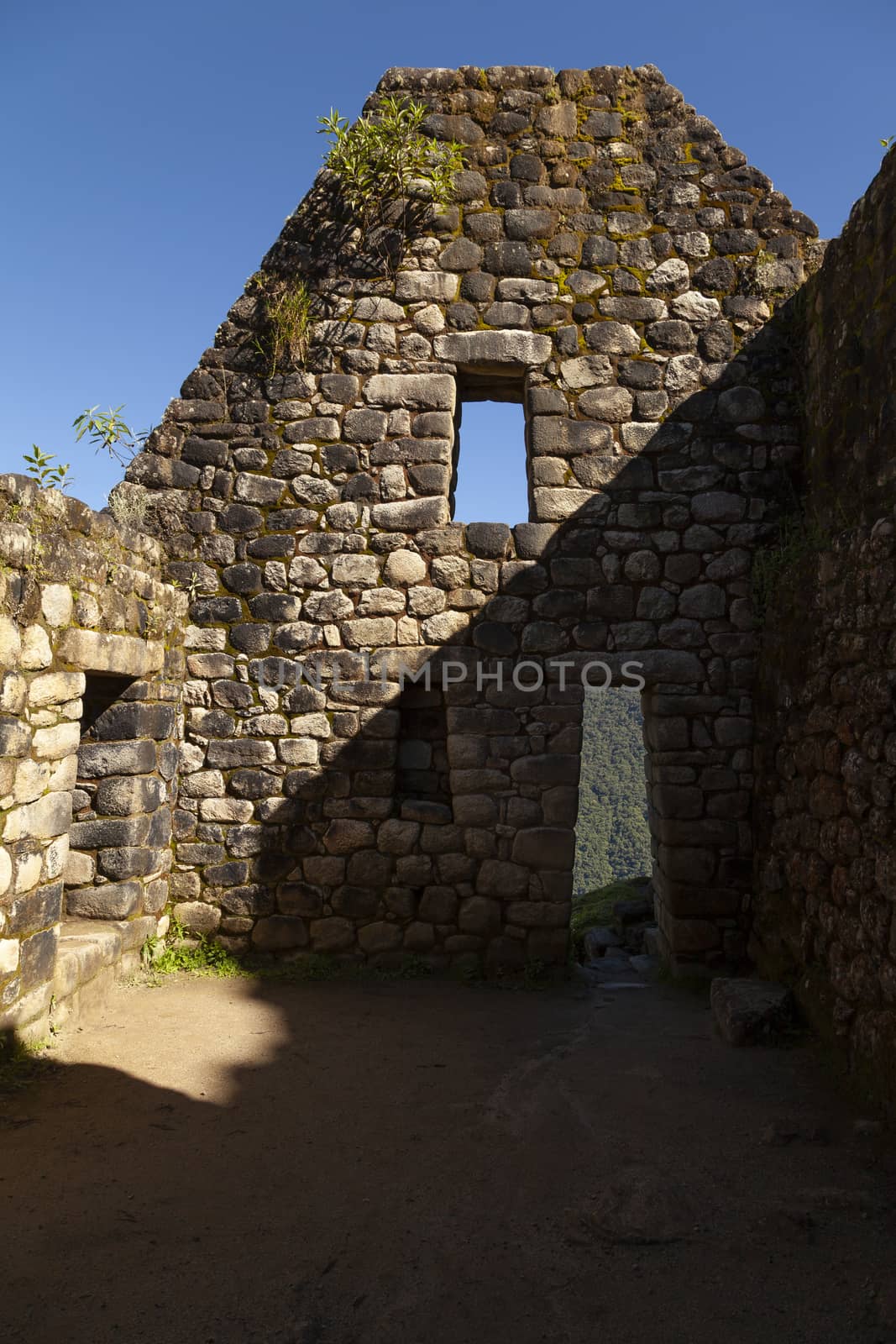 Machu Picchu, Peru - April 6, 2014: Architecture and details of the ancestral constructions and buildings of the Inca civilization, in Huayna Picchu, Peru.