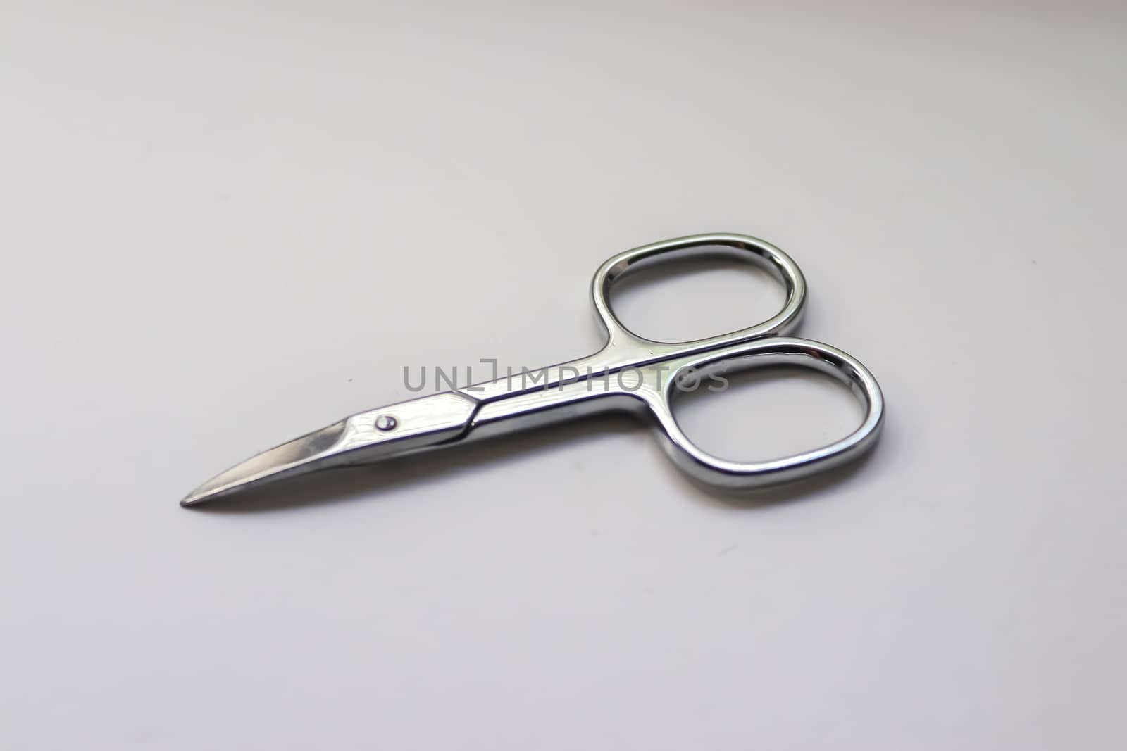 manicure scissors closeup on white background. by MP_foto71