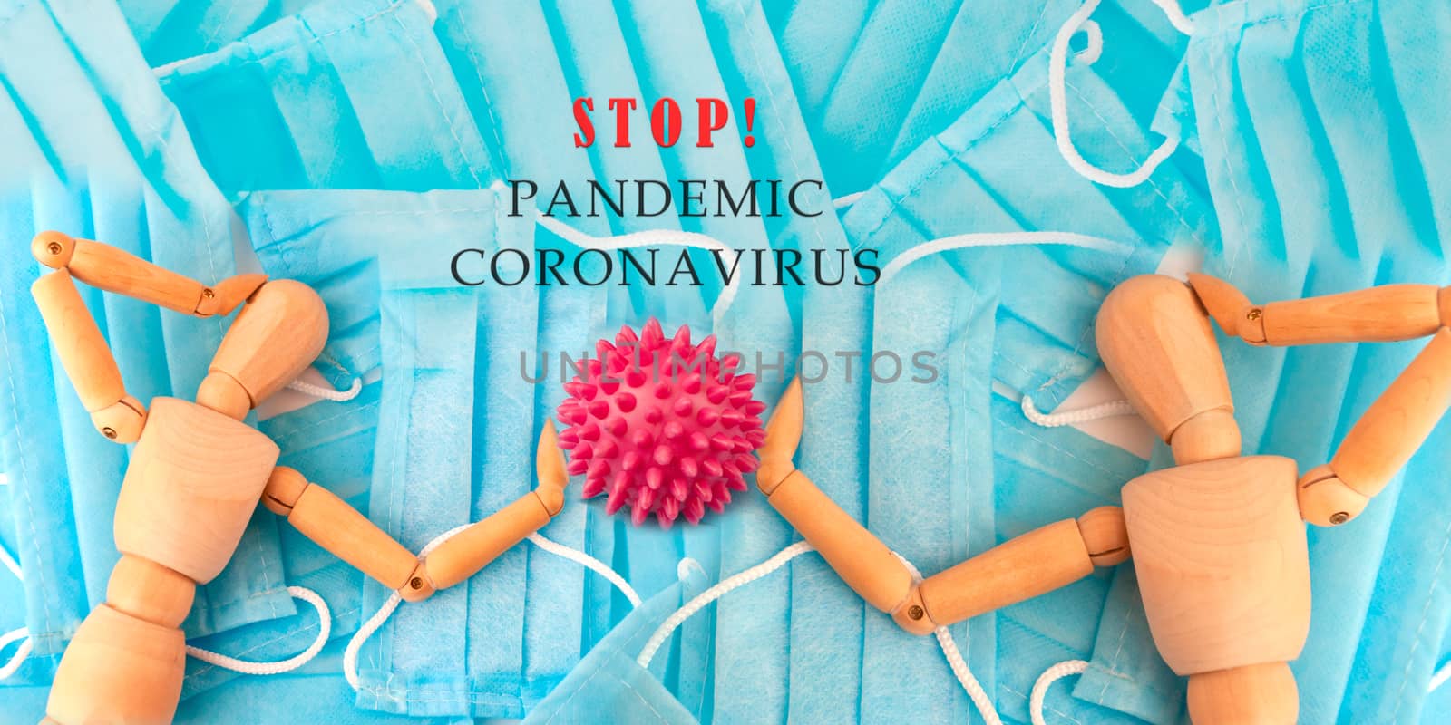 World epidemic of coronavirus,SARS-CoV-2. Two wooden people lie on the background of medical masks and hold a cell of the COVID-19 virus. Outbreak Defense Concept. Copy Space. by Alla_Morozova93