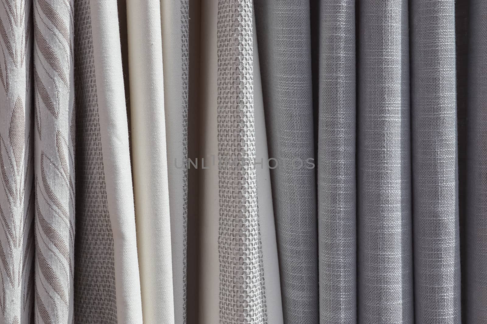 Detailed close up view on samples of cloth and fabrics in differ by MP_foto71