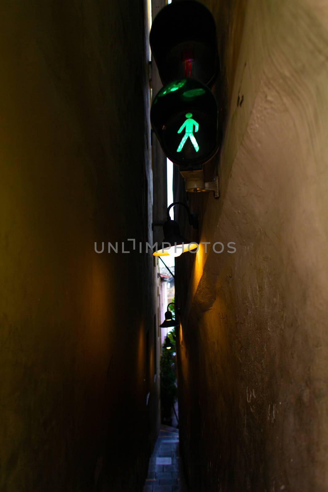The architecture of the strago city of Prague. The narrowest street in Europe. The passage between buildings for one person, regulated by traffic lights by Try_my_best