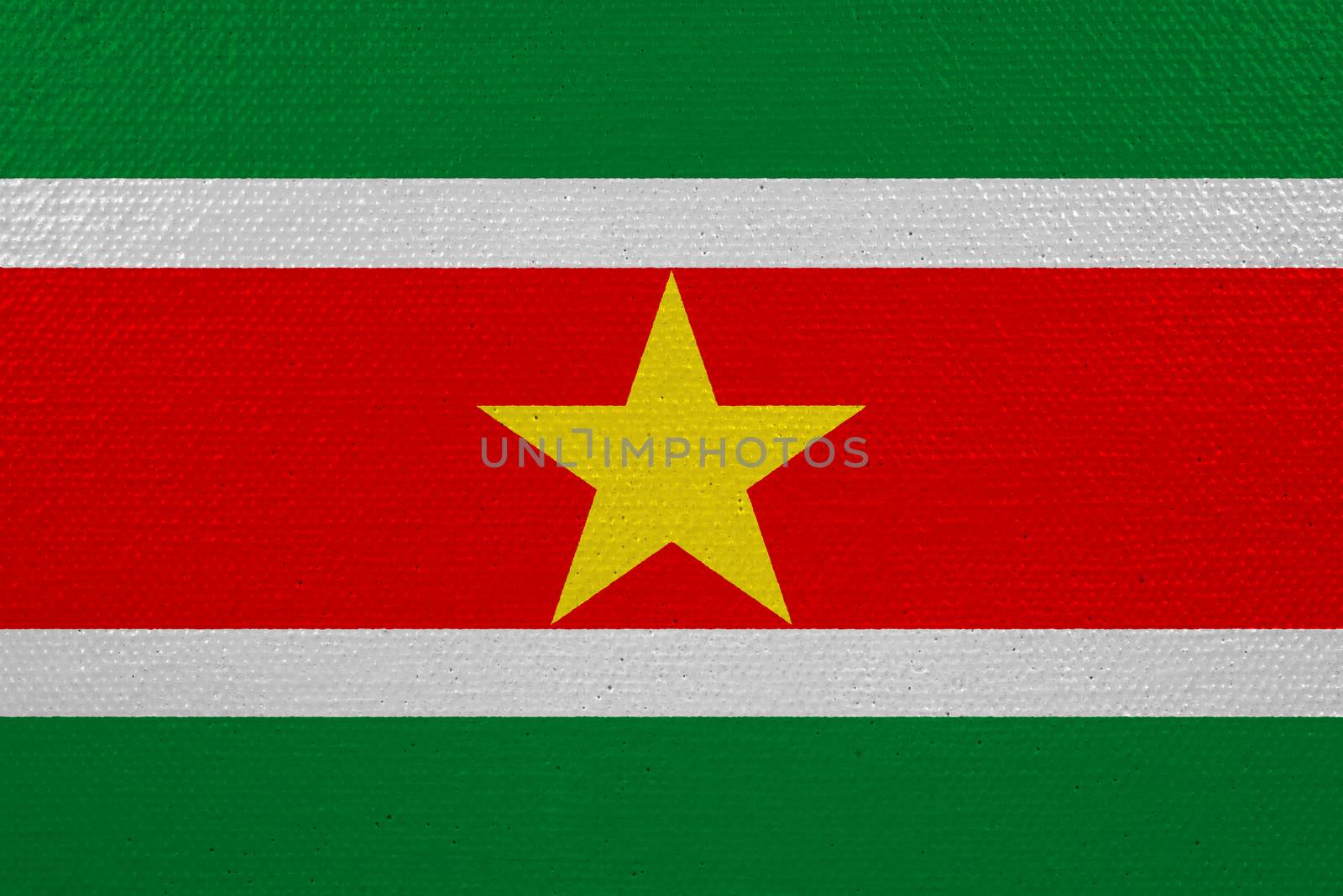 Suriname flag on canvas. Patriotic background. National flag of Suriname