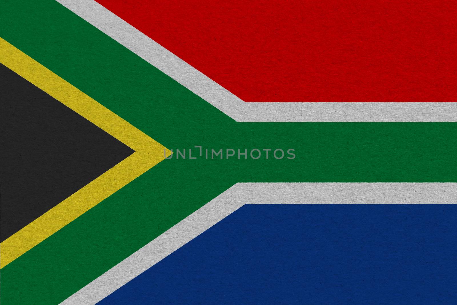 South Africa flag painted on paper. Patriotic background. National flag of South Africa