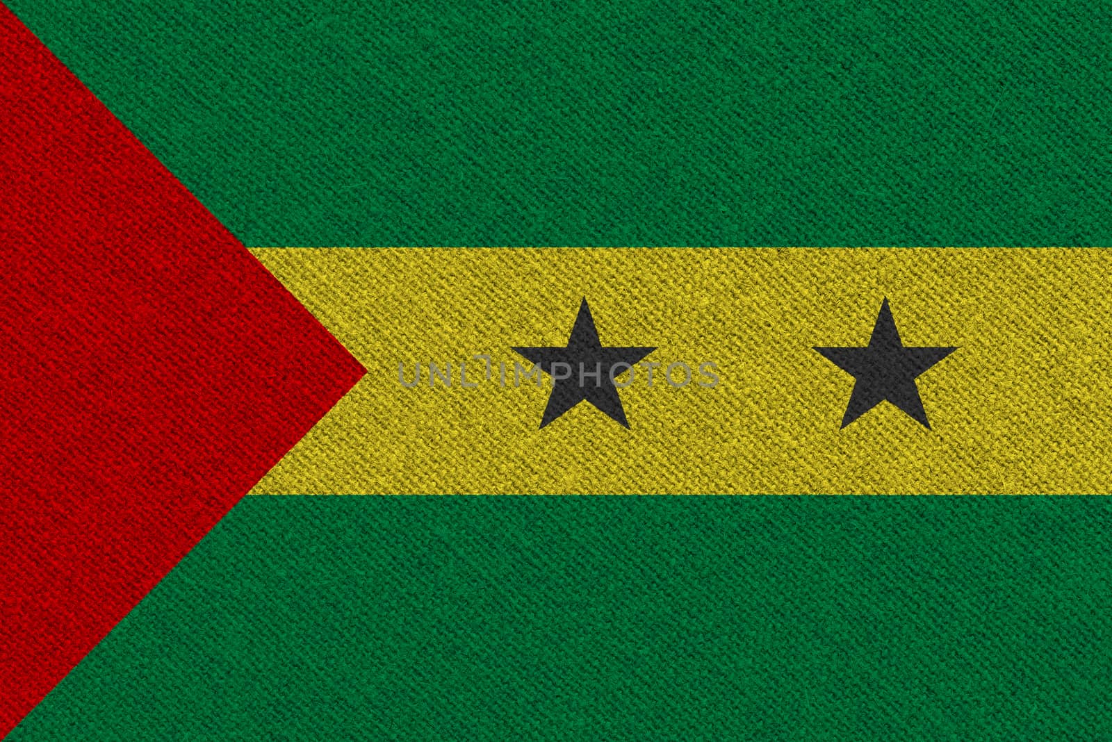 Sao Tome and Principe fabric flag. Patriotic background. National flag of Sao Tome and Principe