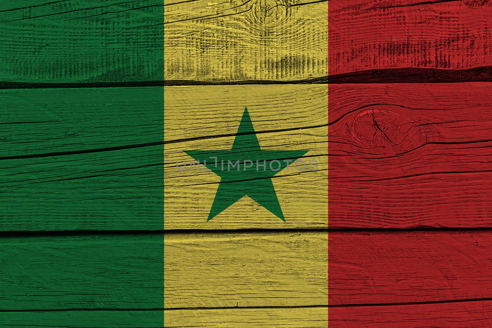 Senegal flag painted on old wood plank. Patriotic background. National flag of Senegal