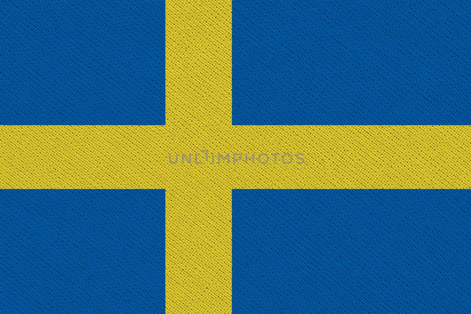 Sweden fabric flag. Patriotic background. National flag of Sweden