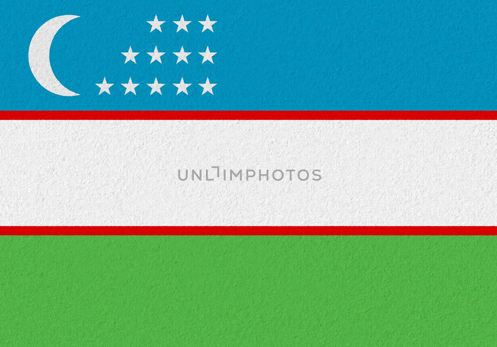 Uzbekistan paper flag. Patriotic background. National flag of Uzbekistan