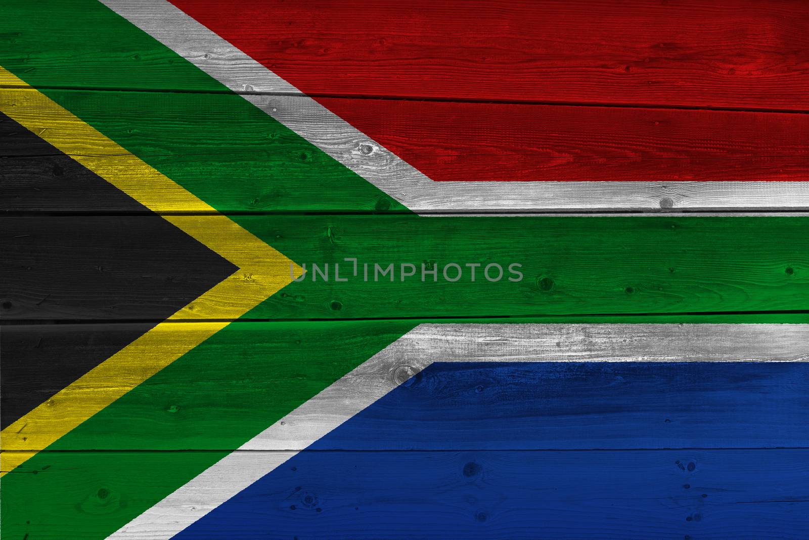 South Africa flag painted on old wood plank. Patriotic background. National flag of South Africa