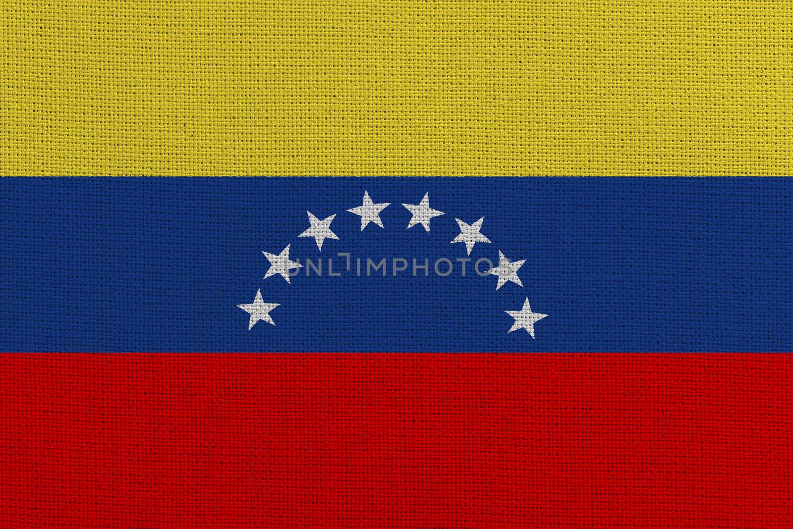 Venezuela fabric flag. Patriotic background. National flag of Venezuela