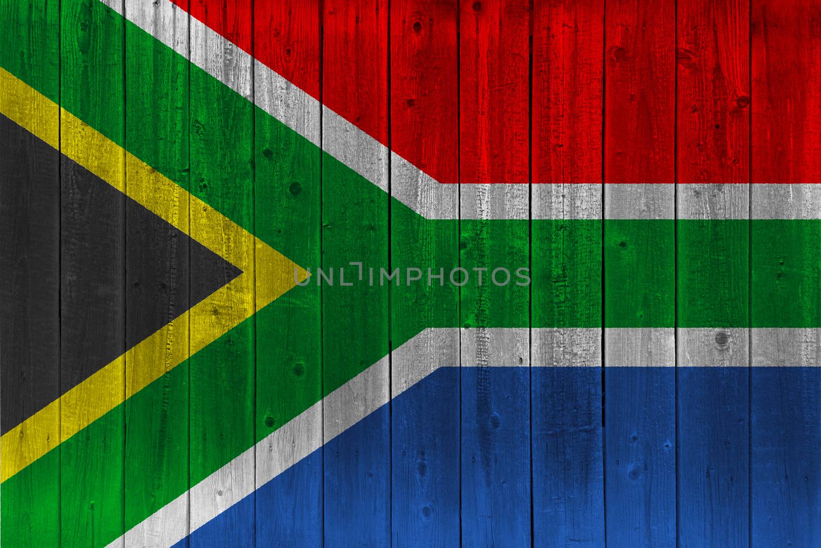 South Africa flag painted on old wood plank. Patriotic background. National flag of South Africa