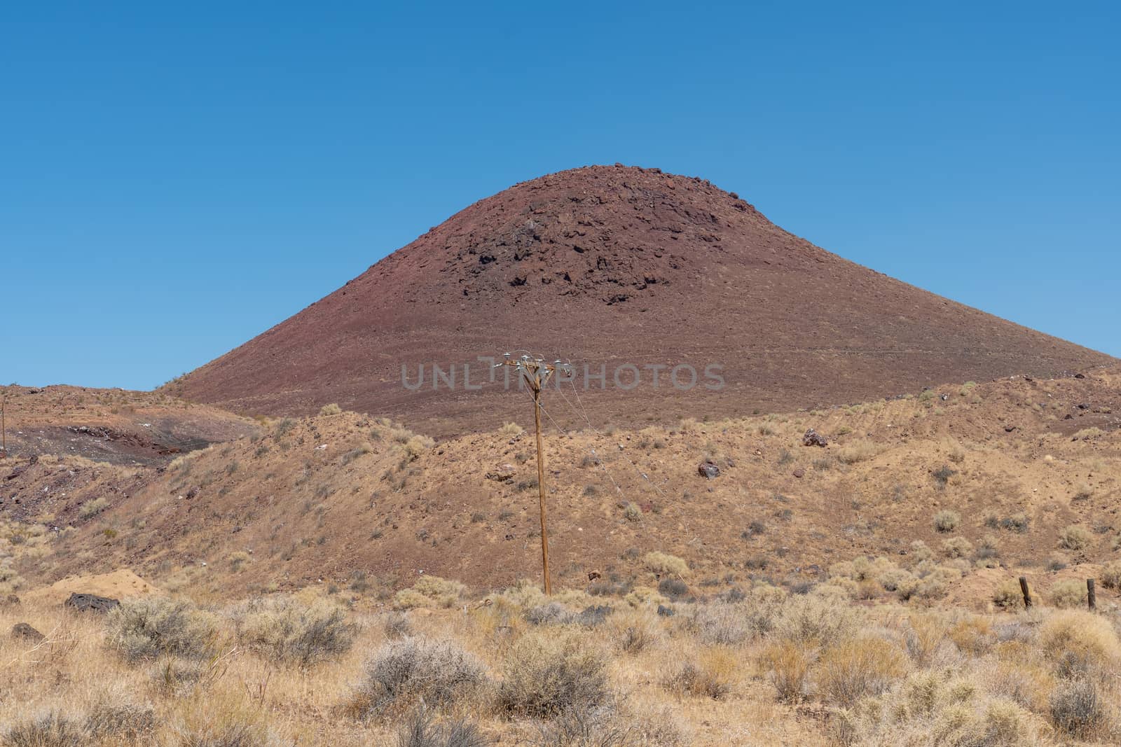 Dry sand dune over desert  by Bonandbon