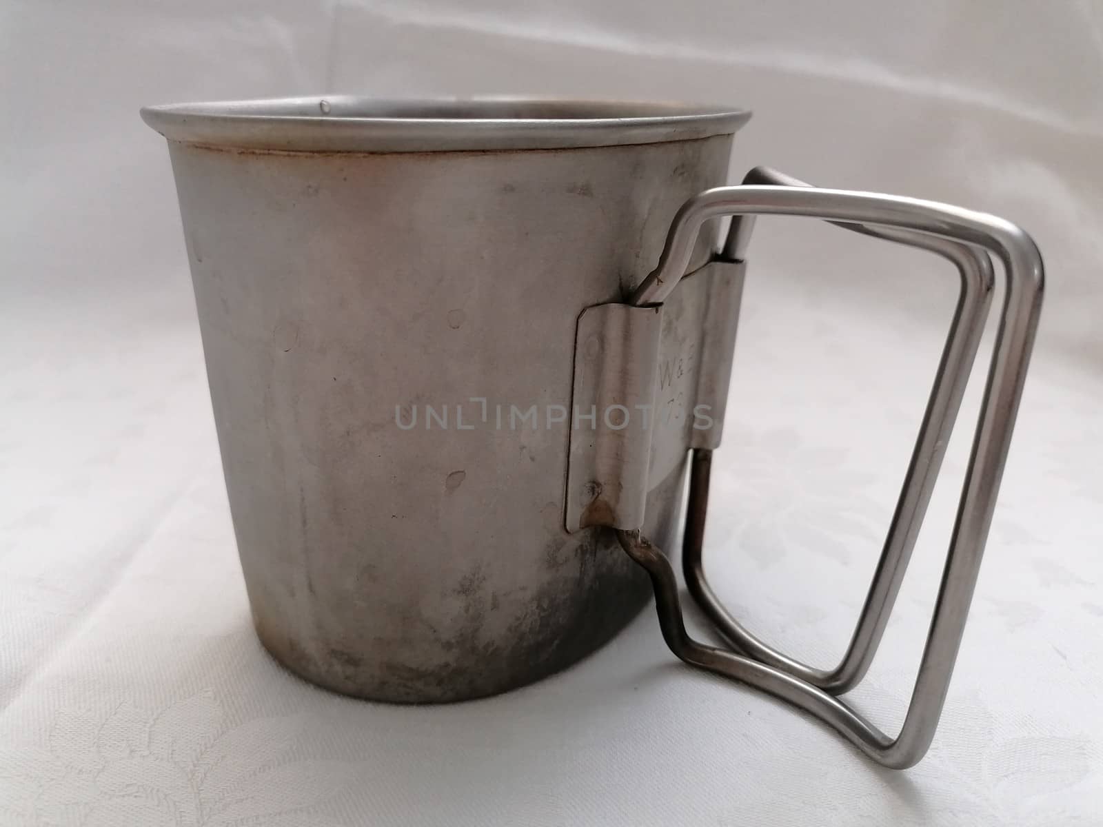 An old steel or tin army mug - crusader cup