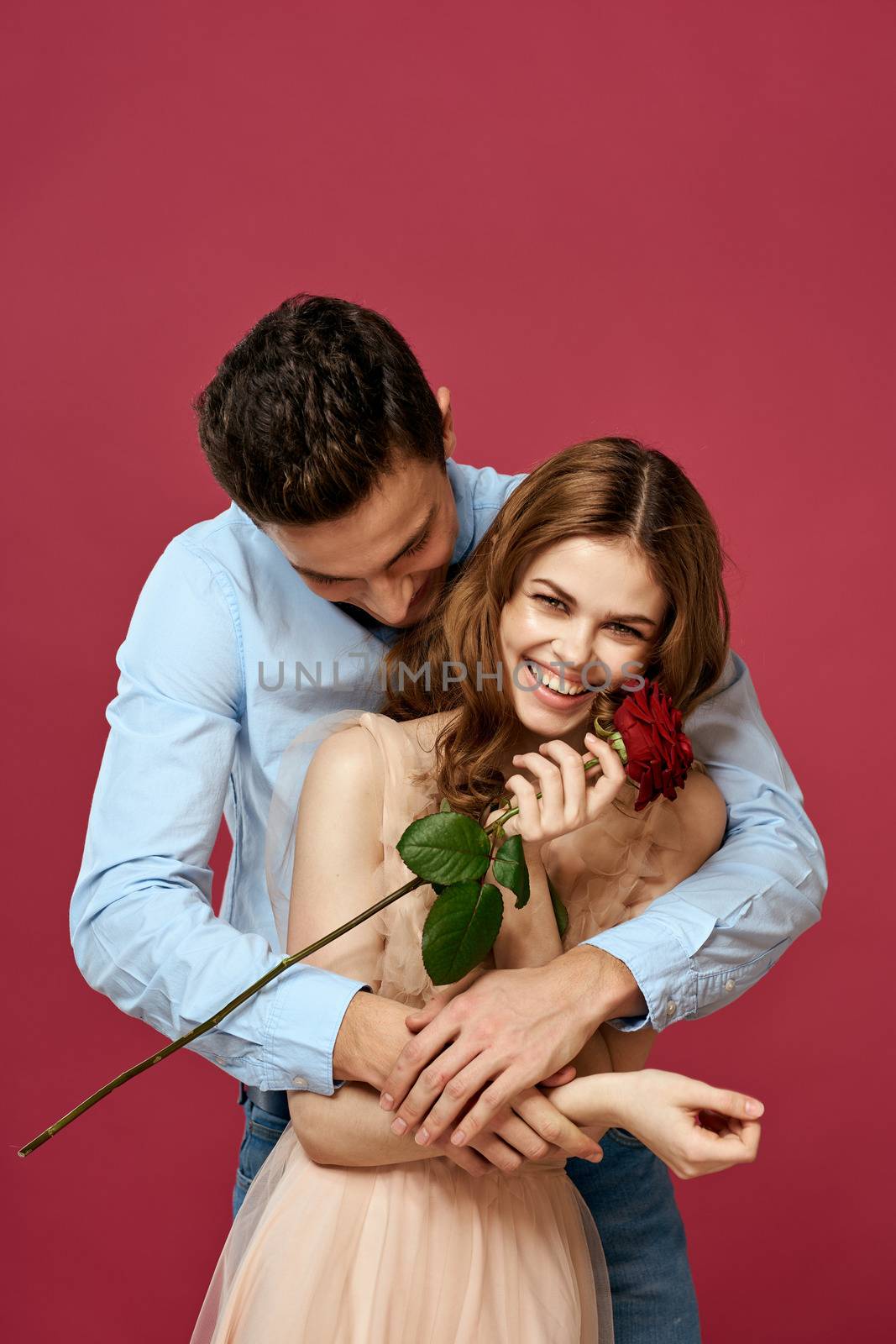 married couple man and woman romance red rose isolated background holidays. High quality photo