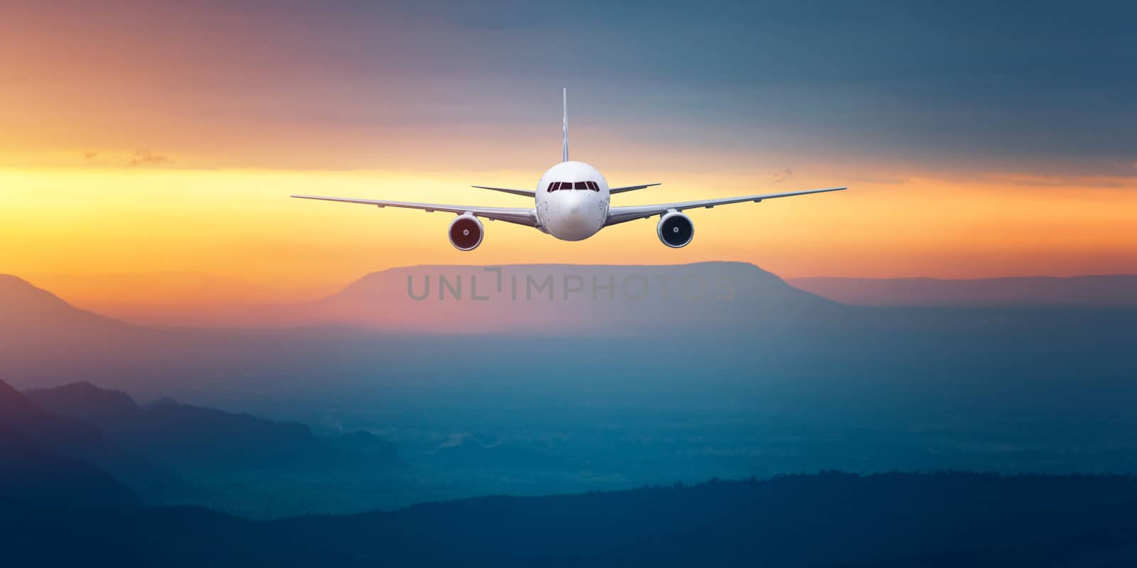 Front of real plane aircraft, isolated on sunset view background by Surasak